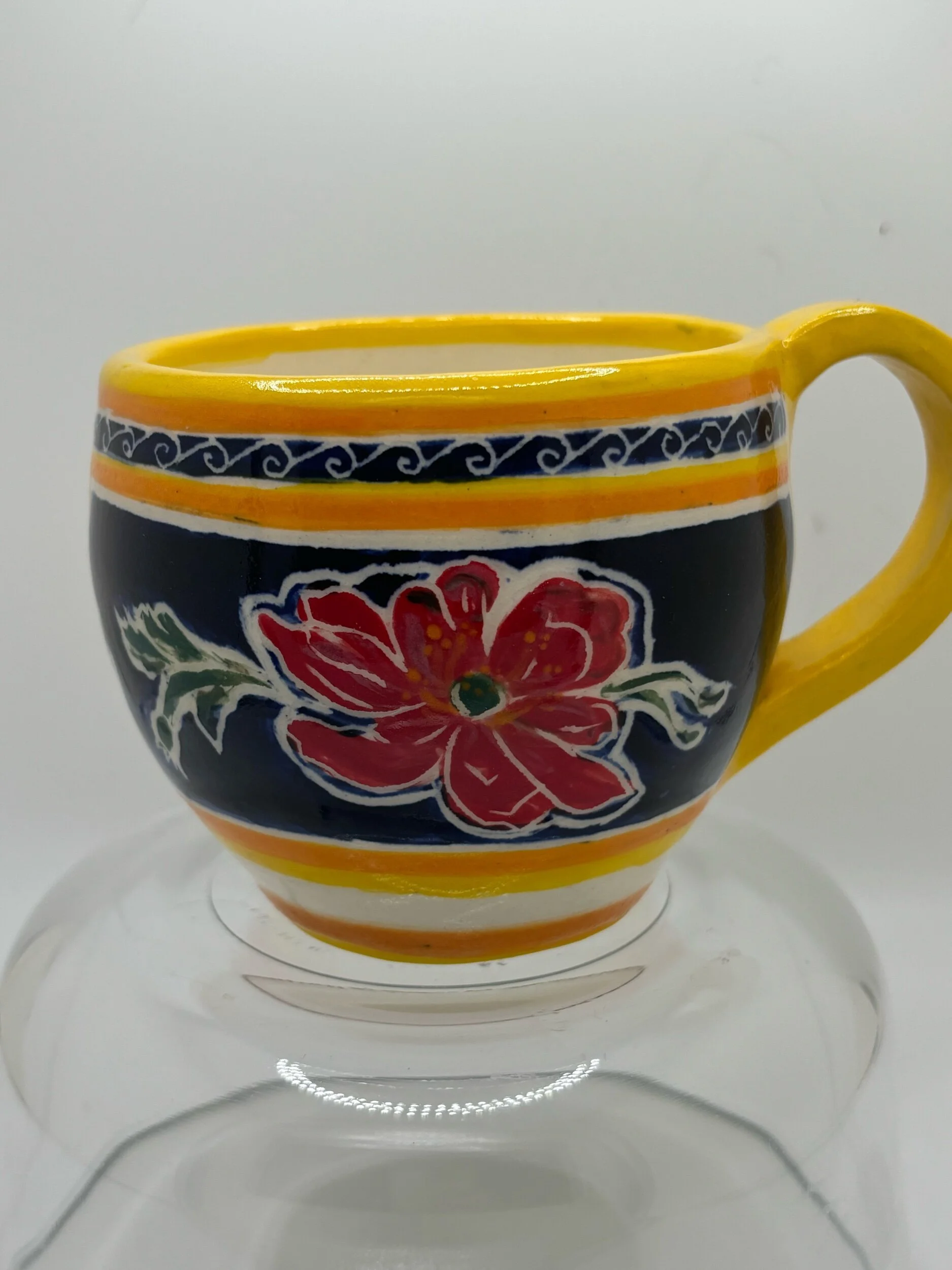 Green cup with flowers