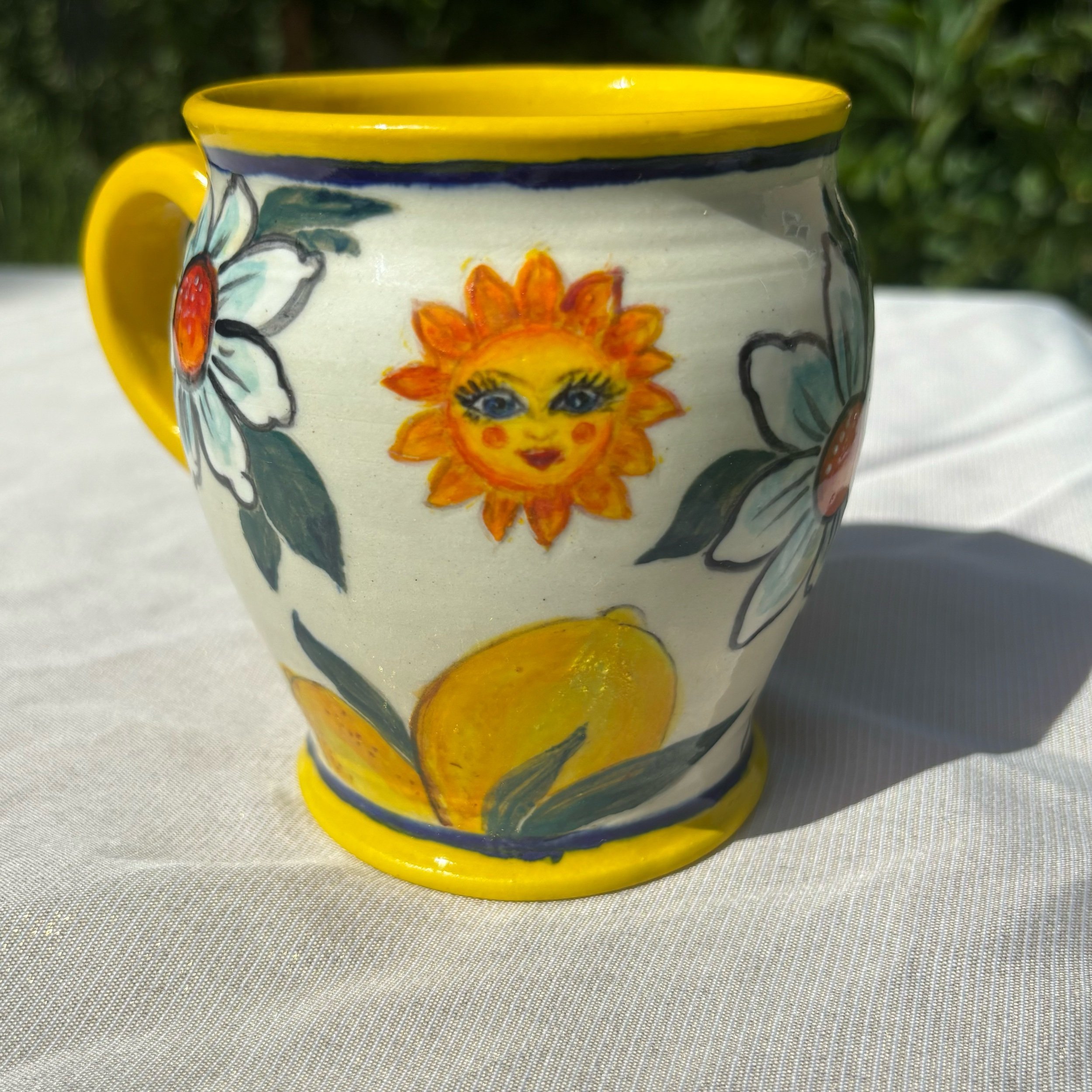 Italian cup with sun