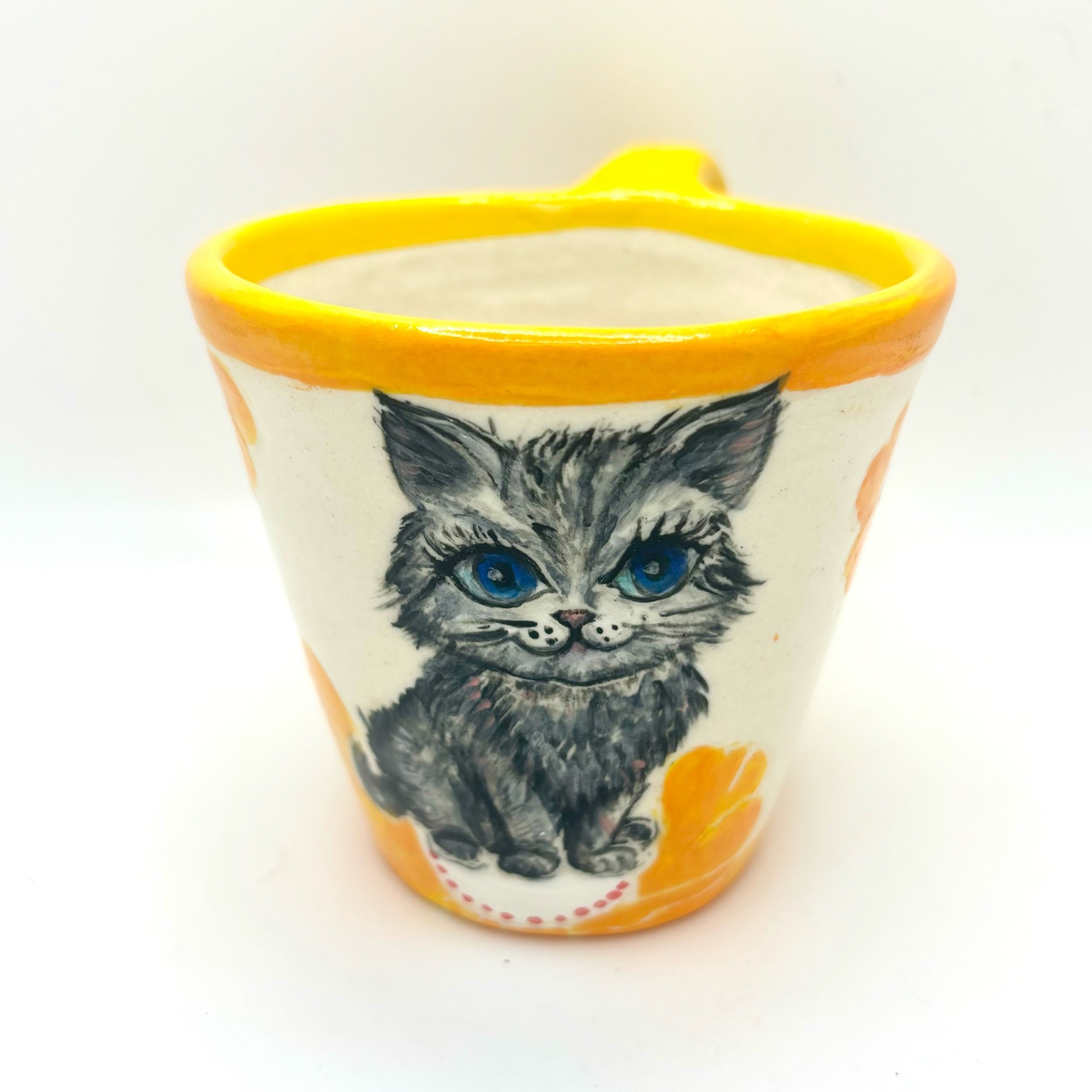 Kitty with orange flowers